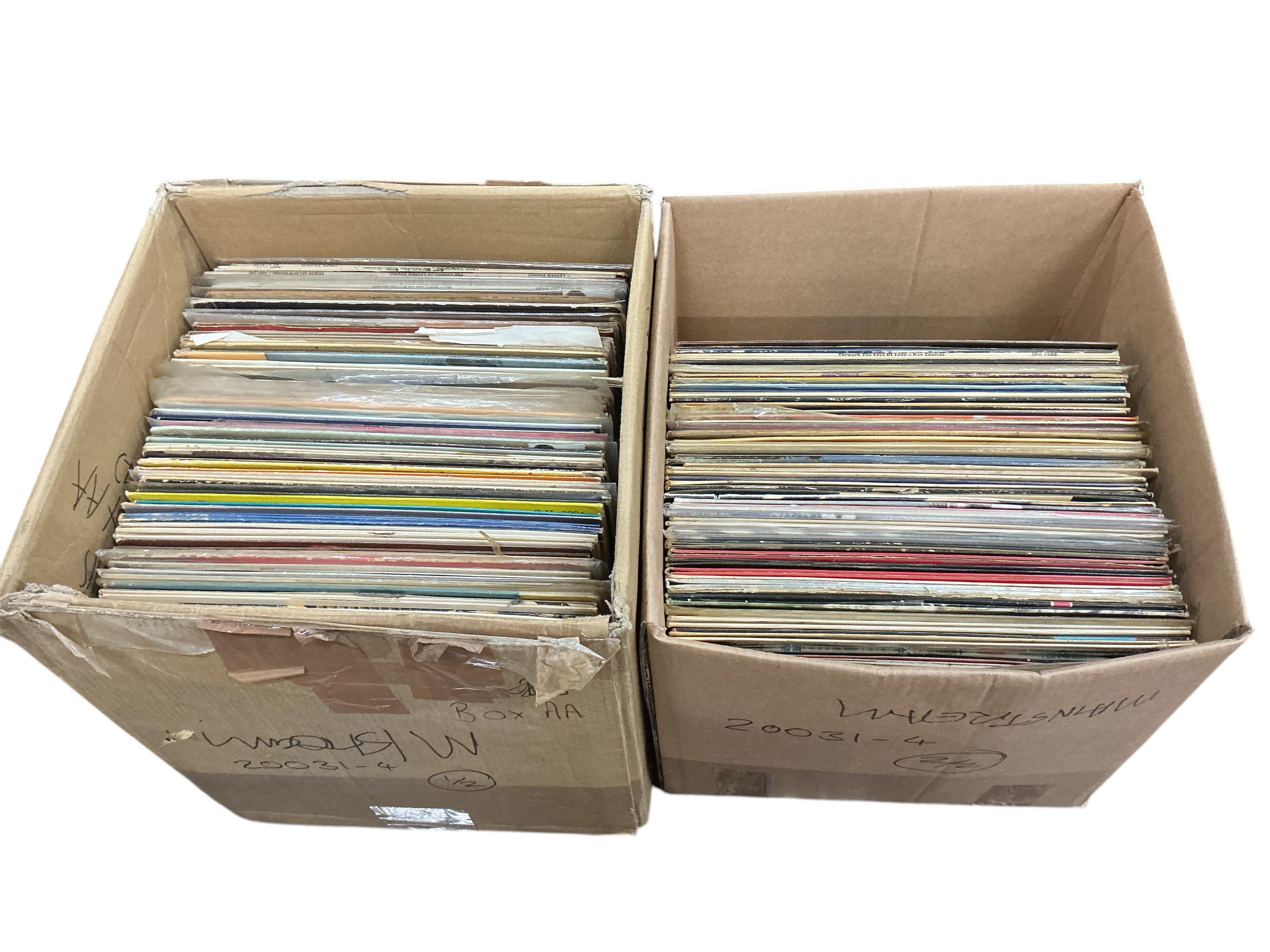 Two boxes of jazz LP record albums, artist including; Louis Armstrong, Lester Young, Stan Getz, Anita O’Day, Jimmy Smith, Dave Brubeck, Duke Ellington, Earl Coleman, Annie Ross, Ray Charles, Erroll Gardner, etc.